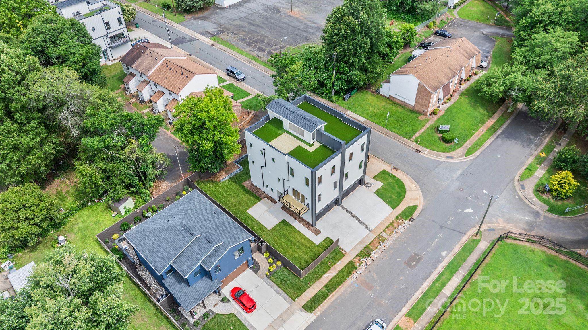 129 French Street, Unit B Charlotte, NC 28216 - Photo 32 of 32 an aerial view of a house
