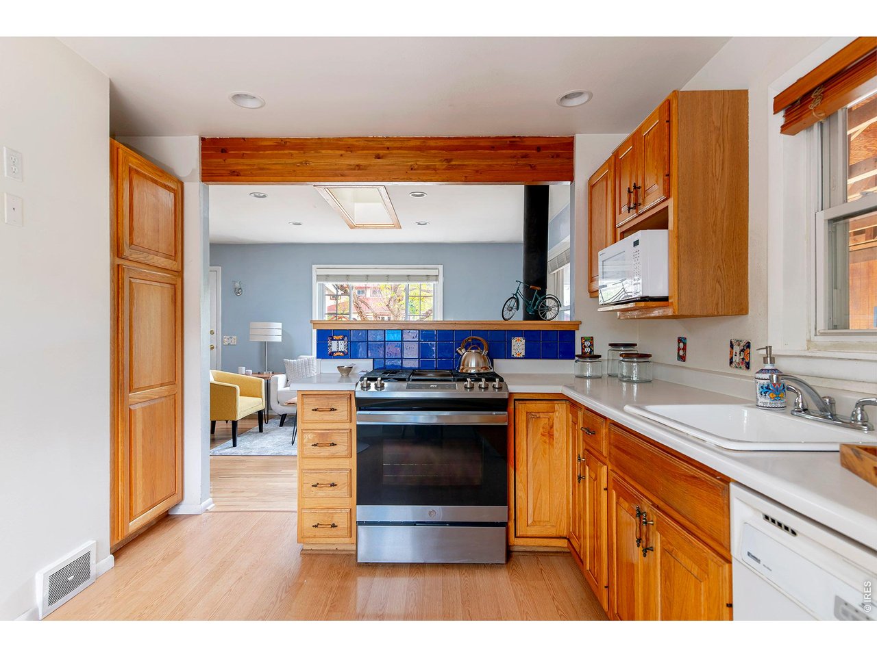 340 27th Street Boulder, CO 80305 - Photo 12 of 42 Open kitchen with gas range