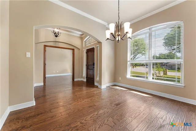 a view of livingroom with window and hardwood floor