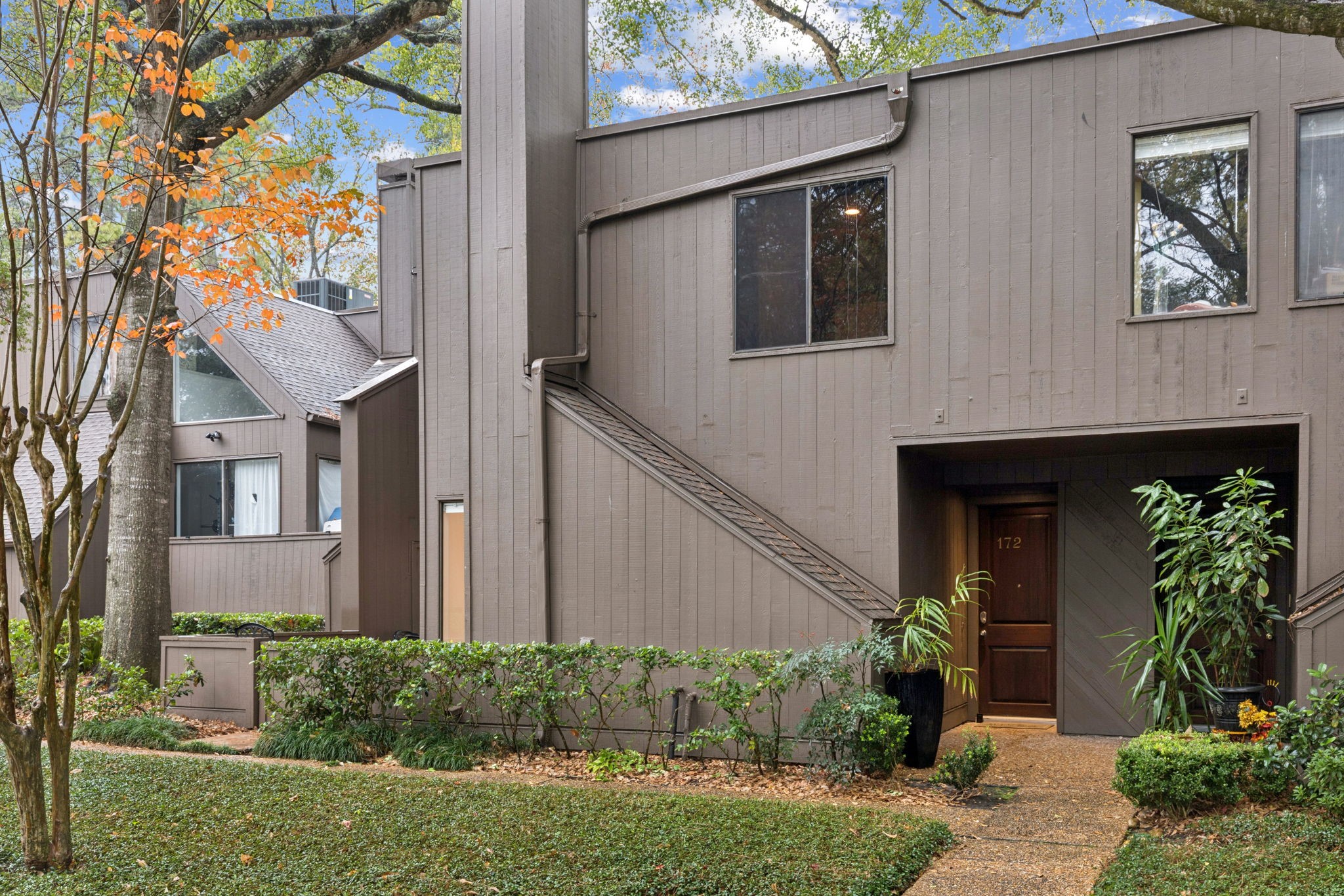 172 Litchfield Lane Houston, TX 77024 - Photo 15 of 16 a front view of a house with garden