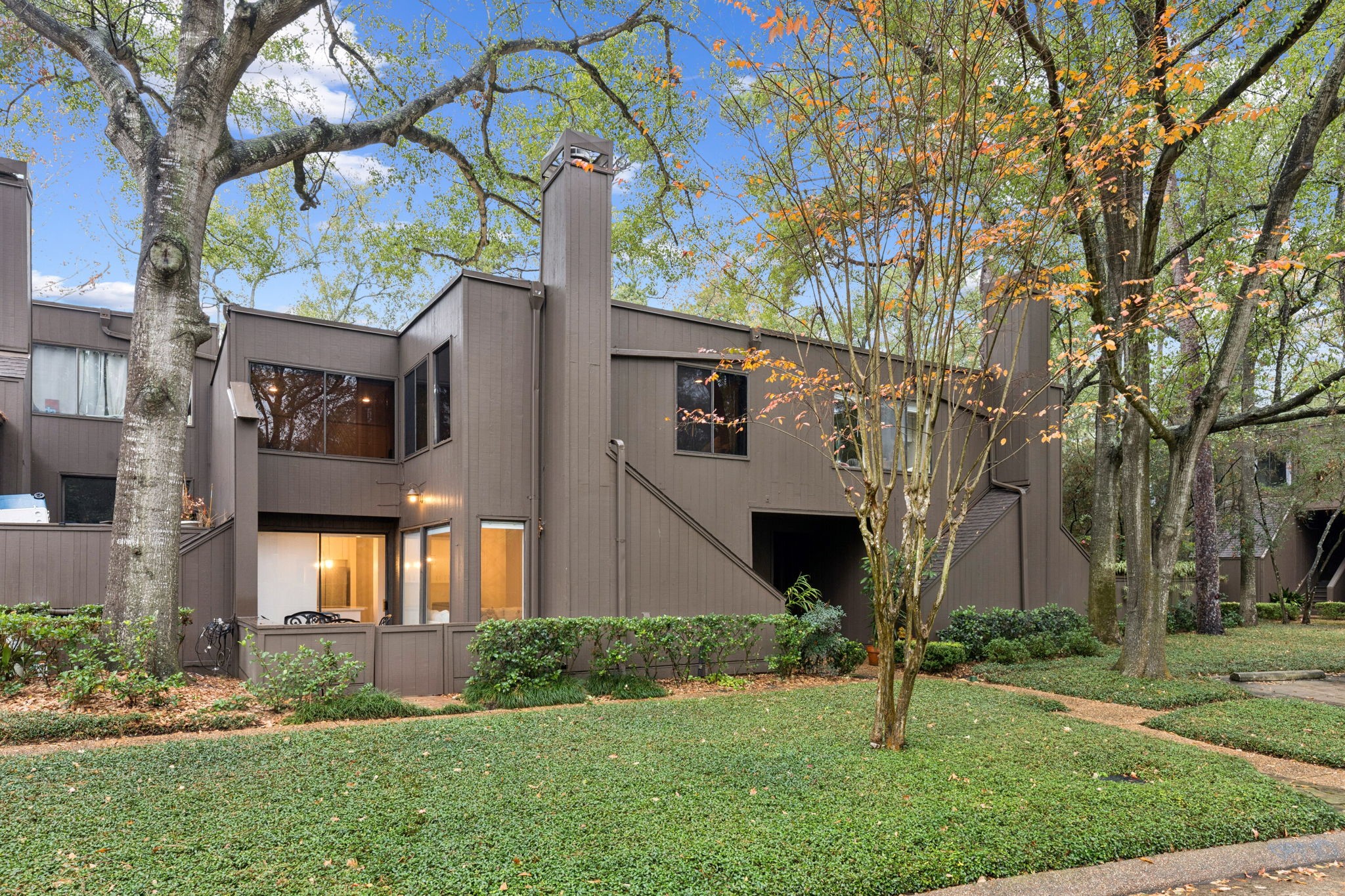 172 Litchfield Lane Houston, TX 77024 - Photo 2 of 16 a front view of a house with a yard