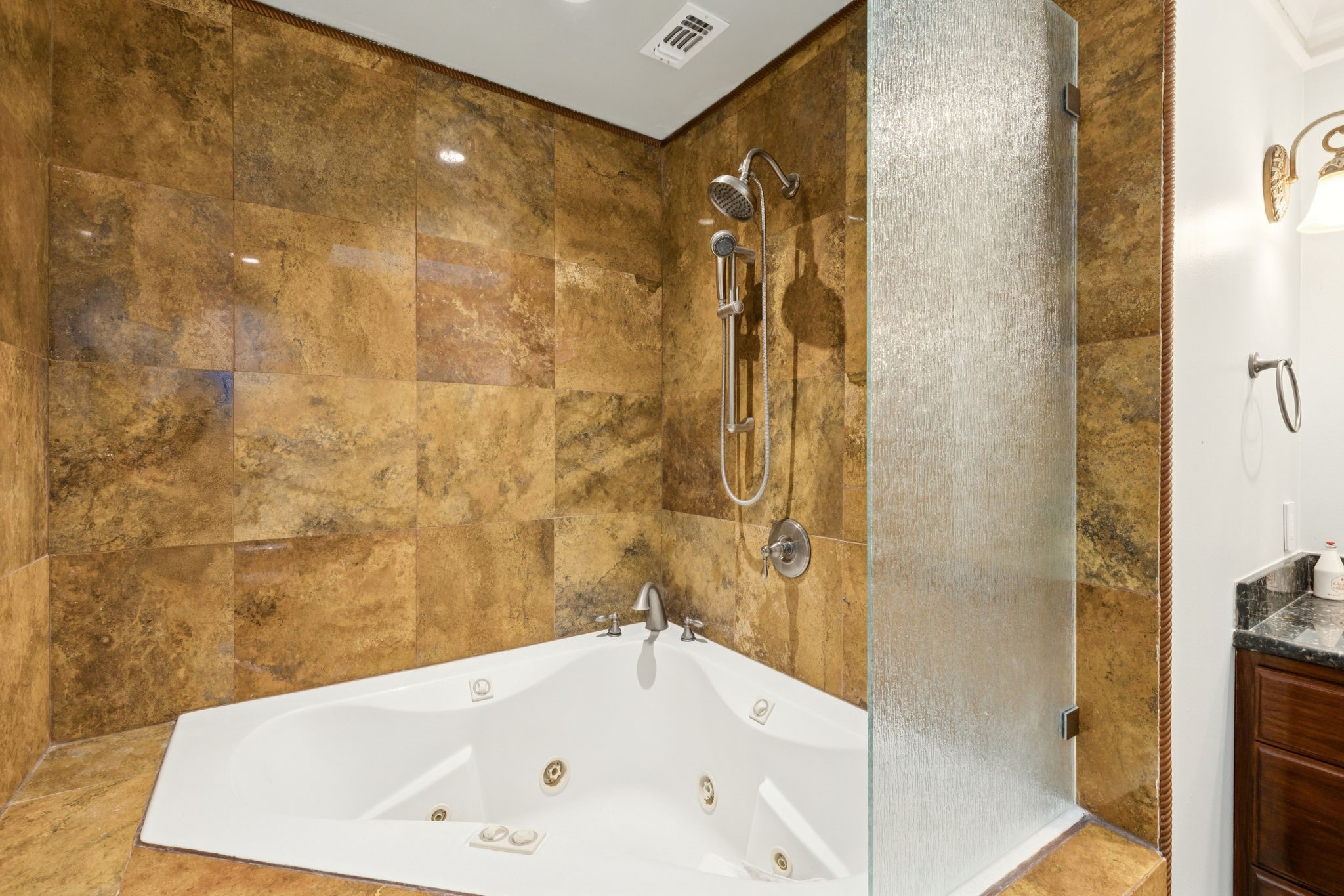 172 Litchfield Lane Houston, TX 77024 - Photo 10 of 16 a bathroom with a tub and shower