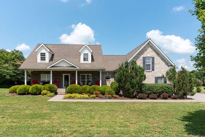 1997 Clara Mathis Road Spring Hill, TN 37174 - Photo 1 of 47 front view of a house with a yard