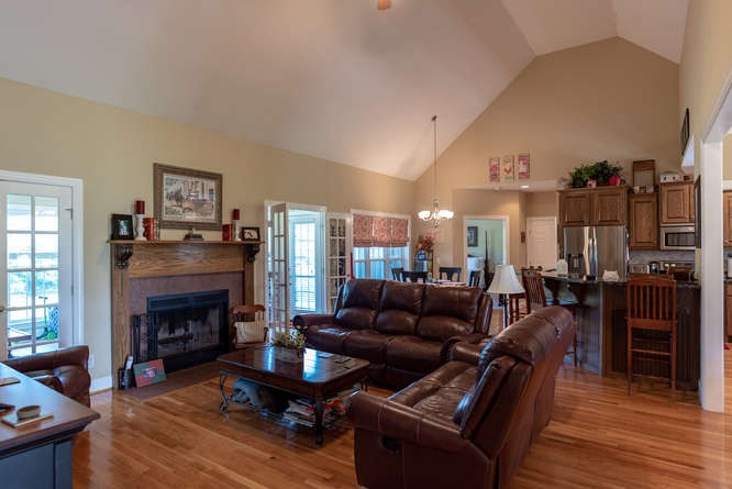 1997 Clara Mathis Road Spring Hill, TN 37174 - Photo 12 of 47 a living room with furniture and a fireplace