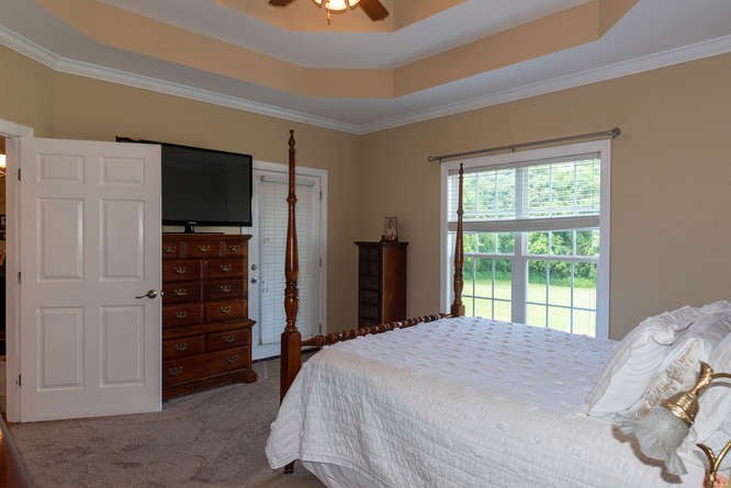1997 Clara Mathis Road Spring Hill, TN 37174 - Photo 21 of 47 a bedroom with a bed closet and a window