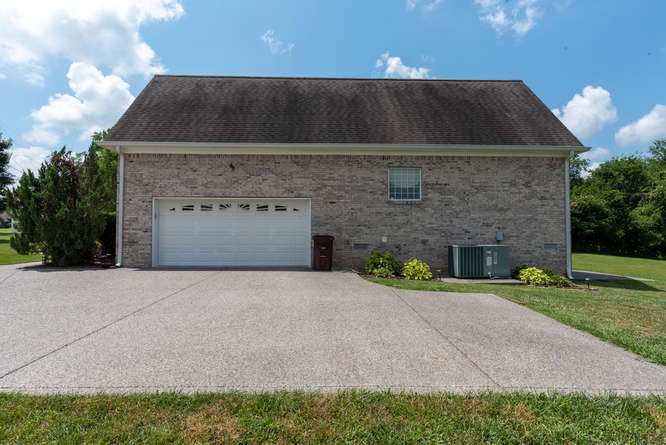 1997 Clara Mathis Road Spring Hill, TN 37174 - Photo 36 of 47 a front view of a house with a yard