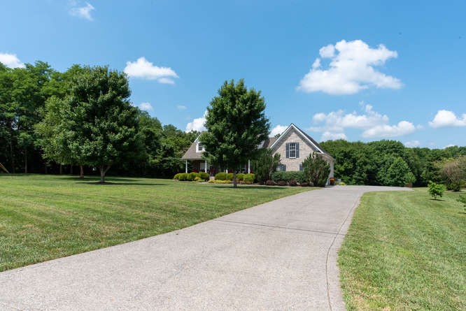 1997 Clara Mathis Road Spring Hill, TN 37174 - Photo 41 of 47 a front view of a house with garden