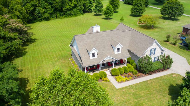 1997 Clara Mathis Road Spring Hill, TN 37174 - Photo 44 of 47 an aerial view of a house with a garden and swimming pool