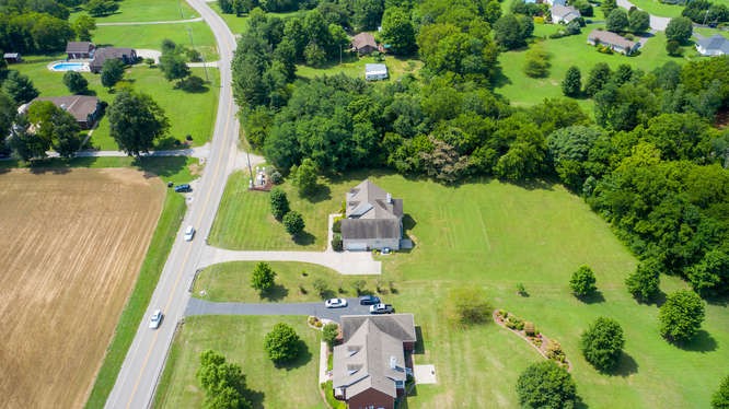 1997 Clara Mathis Road Spring Hill, TN 37174 - Photo 46 of 47 an aerial view of a residential houses with outdoor space and trees all around