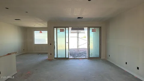an empty room with windows