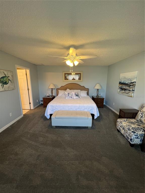 8 Firethorn Lane Palm Coast, FL 32137 - Photo 15 of 28 a bedroom with bed and window