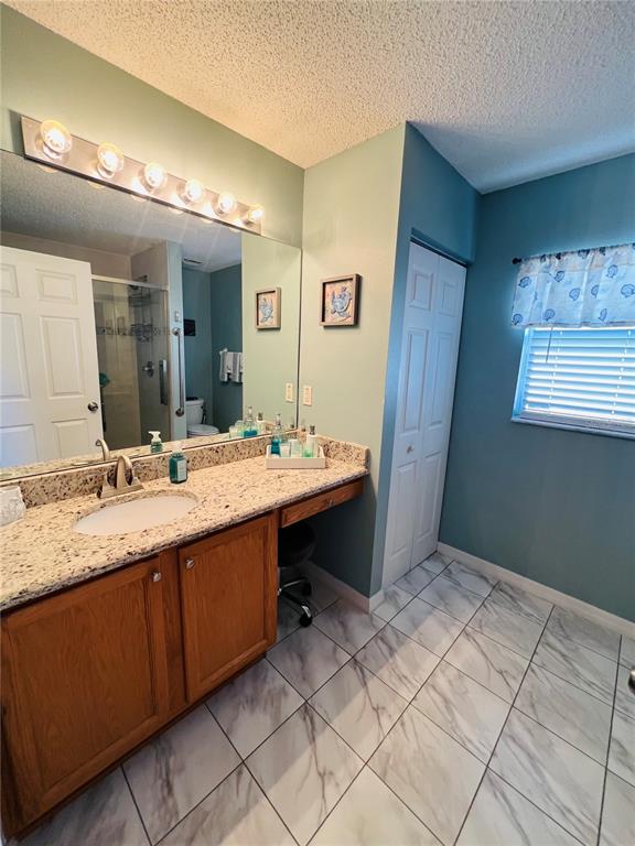 8 Firethorn Lane Palm Coast, FL 32137 - Photo 18 of 28 a bathroom with a sink double vanity and a mirror