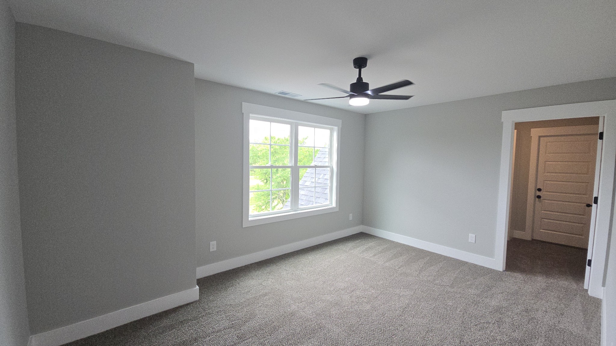 11533 Karo Road Bell Buckle, TN 37020 - Photo 15 of 22 an empty room with windows and ceiling fan