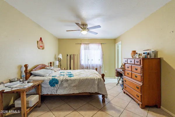 a bathroom with a sink toilet mirror and shower
