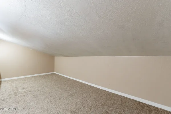 a view of a livingroom with a staircase