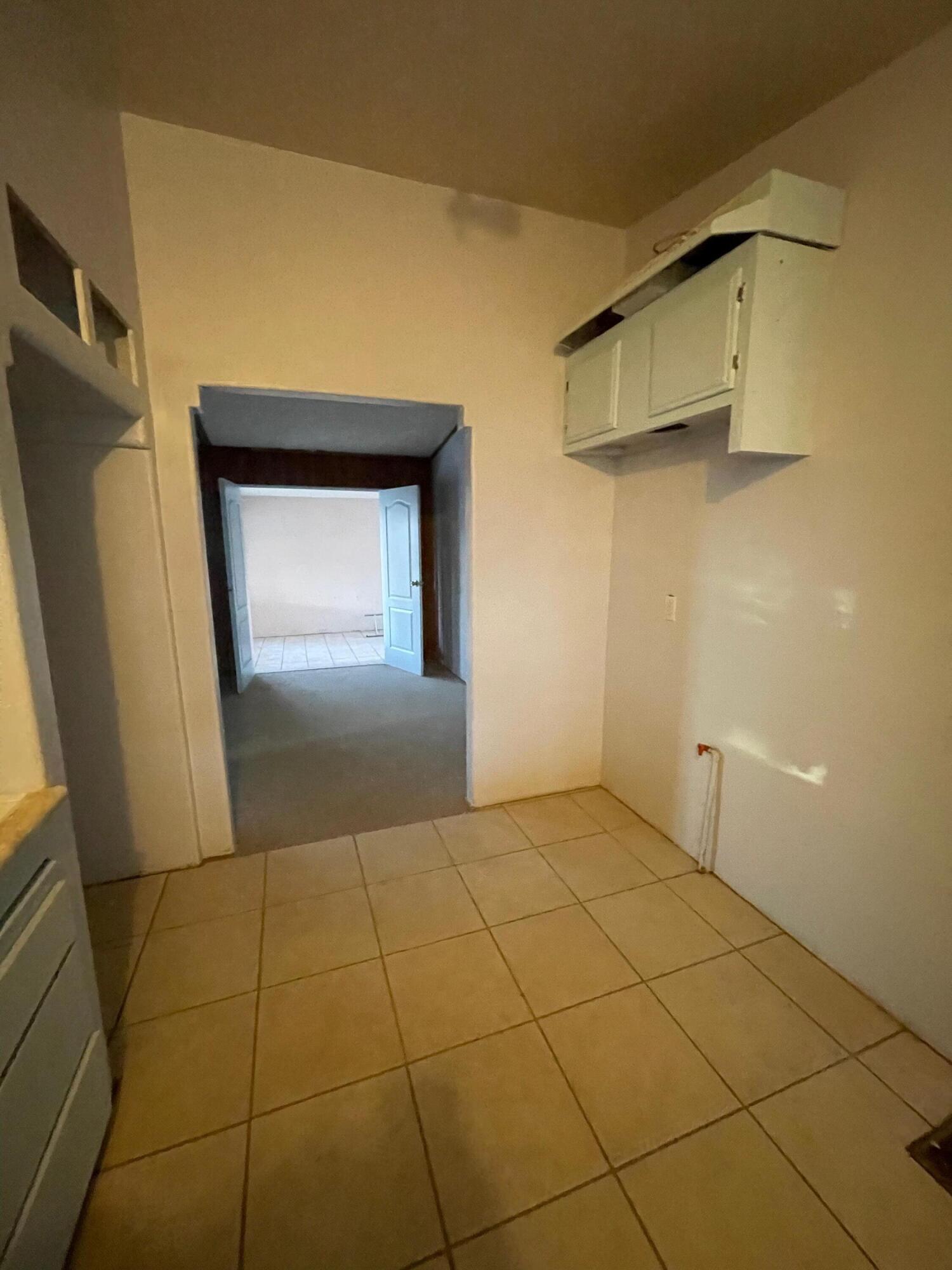 32142 Wells Fargo Road Thousand Palms, CA 92276 - Photo 17 of 25 a view of a livingroom with wooden floor and a staircase