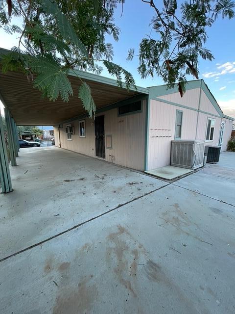 32142 Wells Fargo Road Thousand Palms, CA 92276 - Photo 23 of 25 a view of a house with a yard
