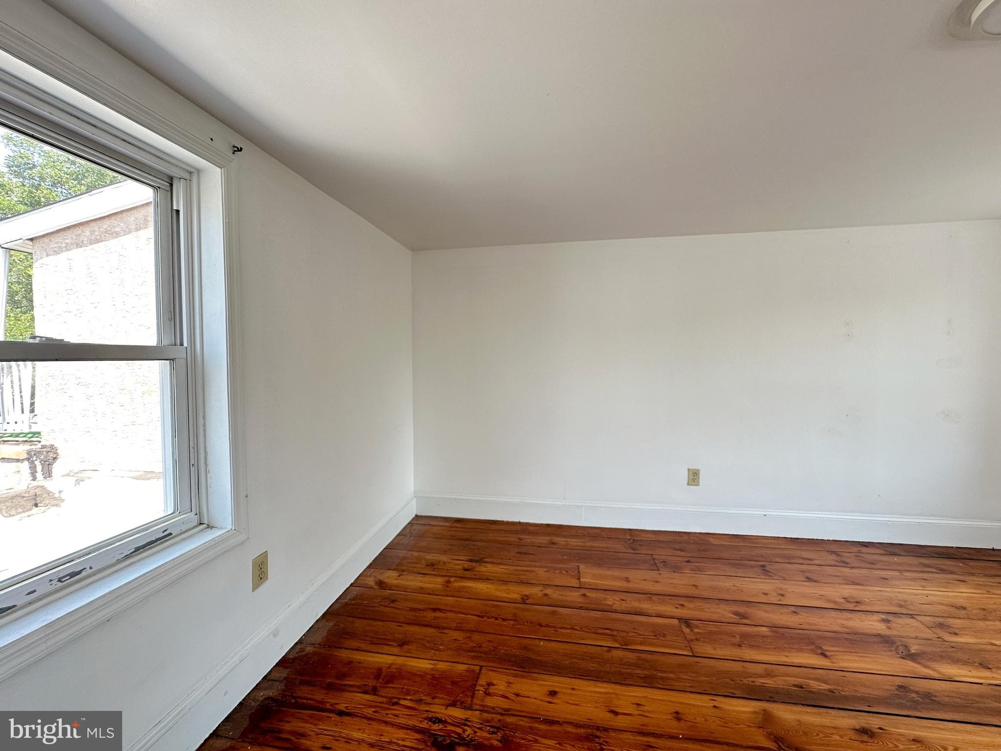 1232 North Hancock Street Philadelphia, PA 19122 - Photo 19 of 44 a view of an empty room and window
