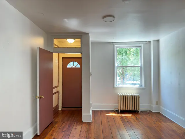 a view of livingroom with furniture and wooden floor