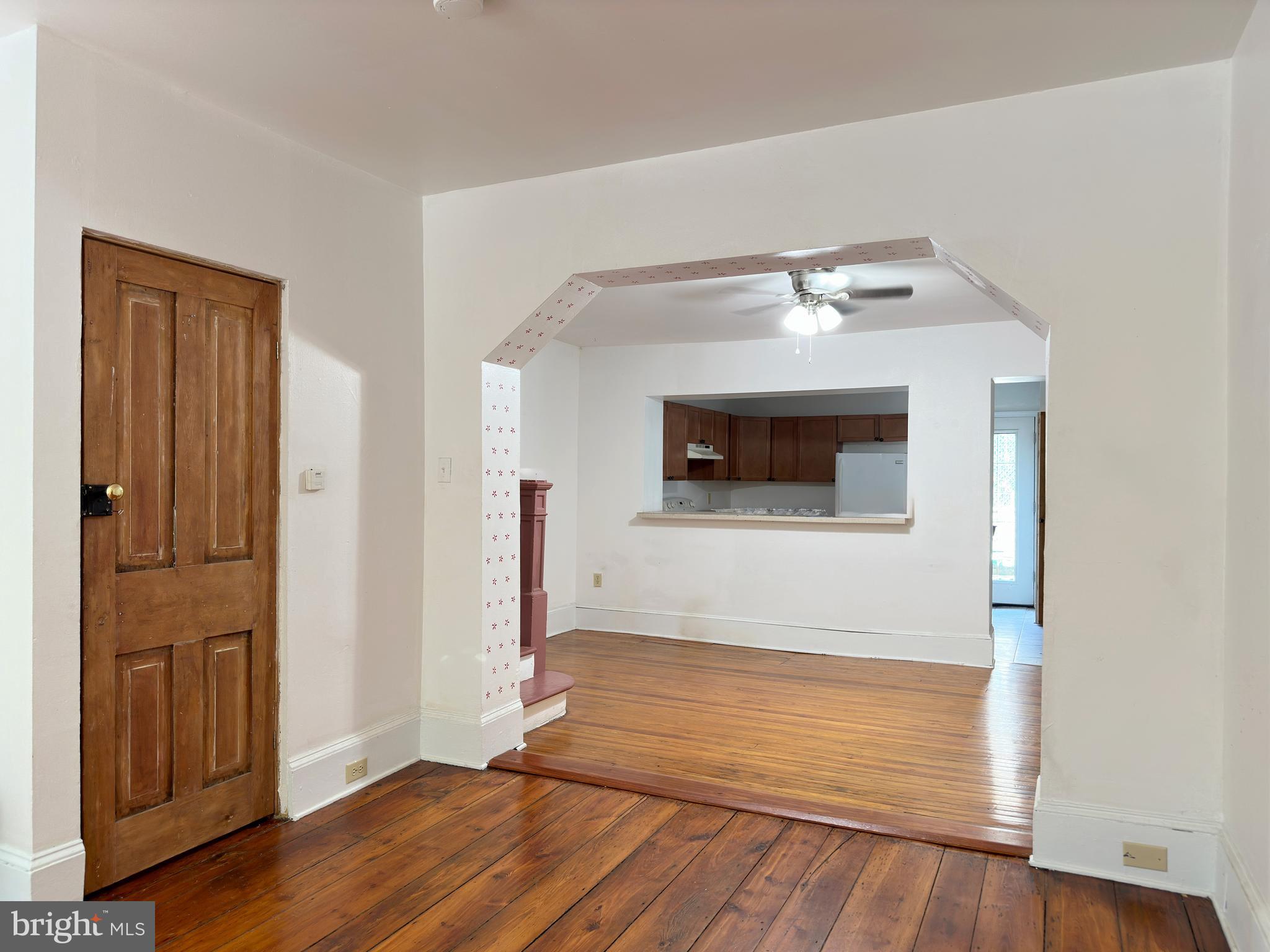 1232 North Hancock Street Philadelphia, PA 19122 - Photo 23 of 44 a view of an empty room with wooden floor