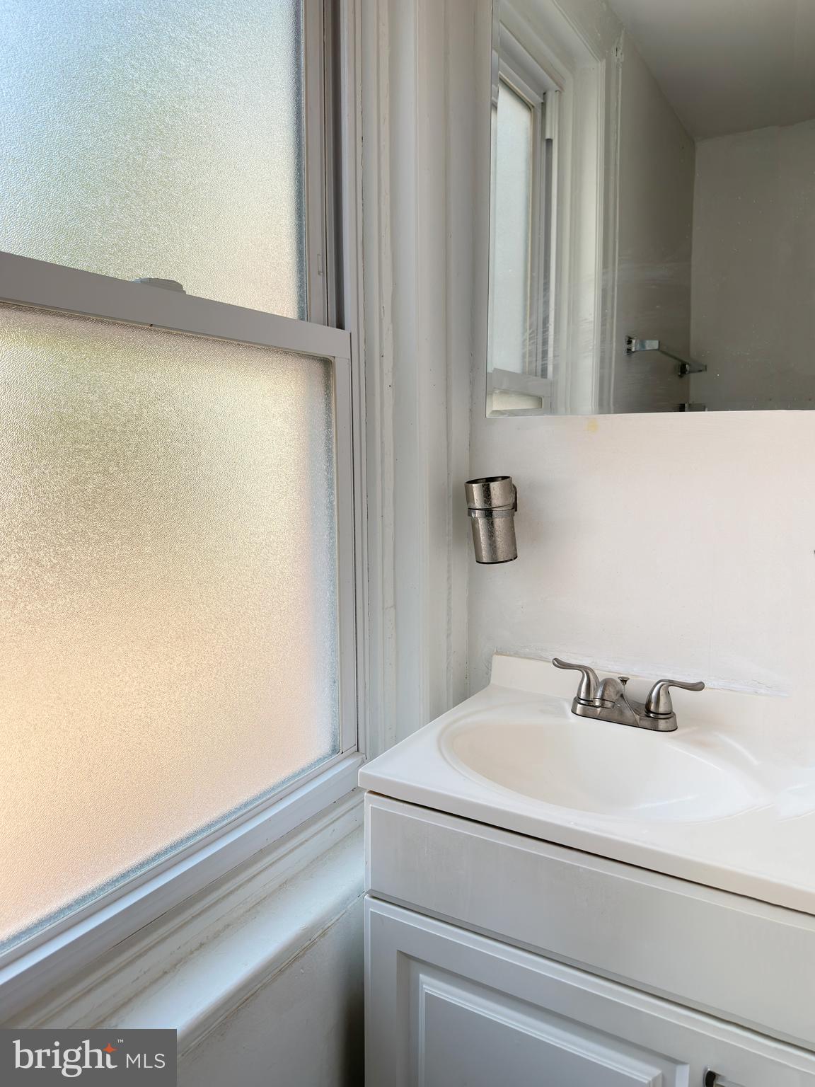 1232 North Hancock Street Philadelphia, PA 19122 - Photo 28 of 44 a bathroom with a shower and a sink