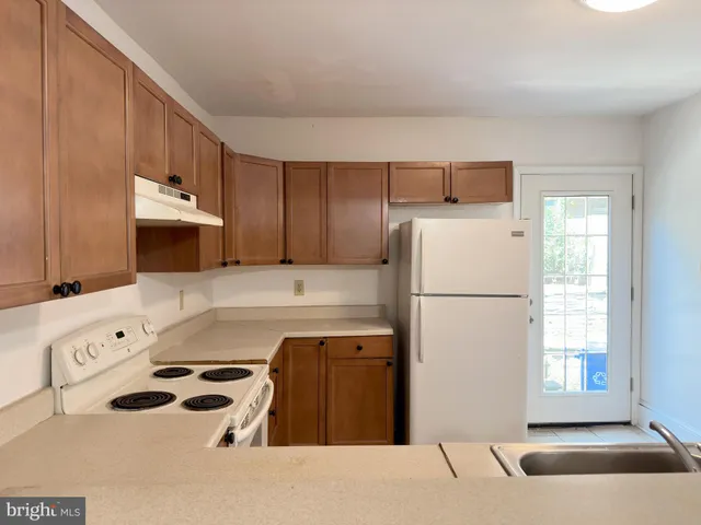 a view of a livingroom from a hallway