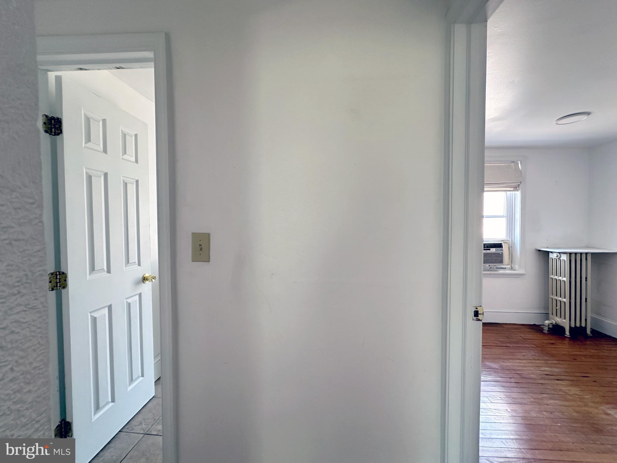 1232 North Hancock Street Philadelphia, PA 19122 - Photo 38 of 44 a view of a livingroom from a hallway