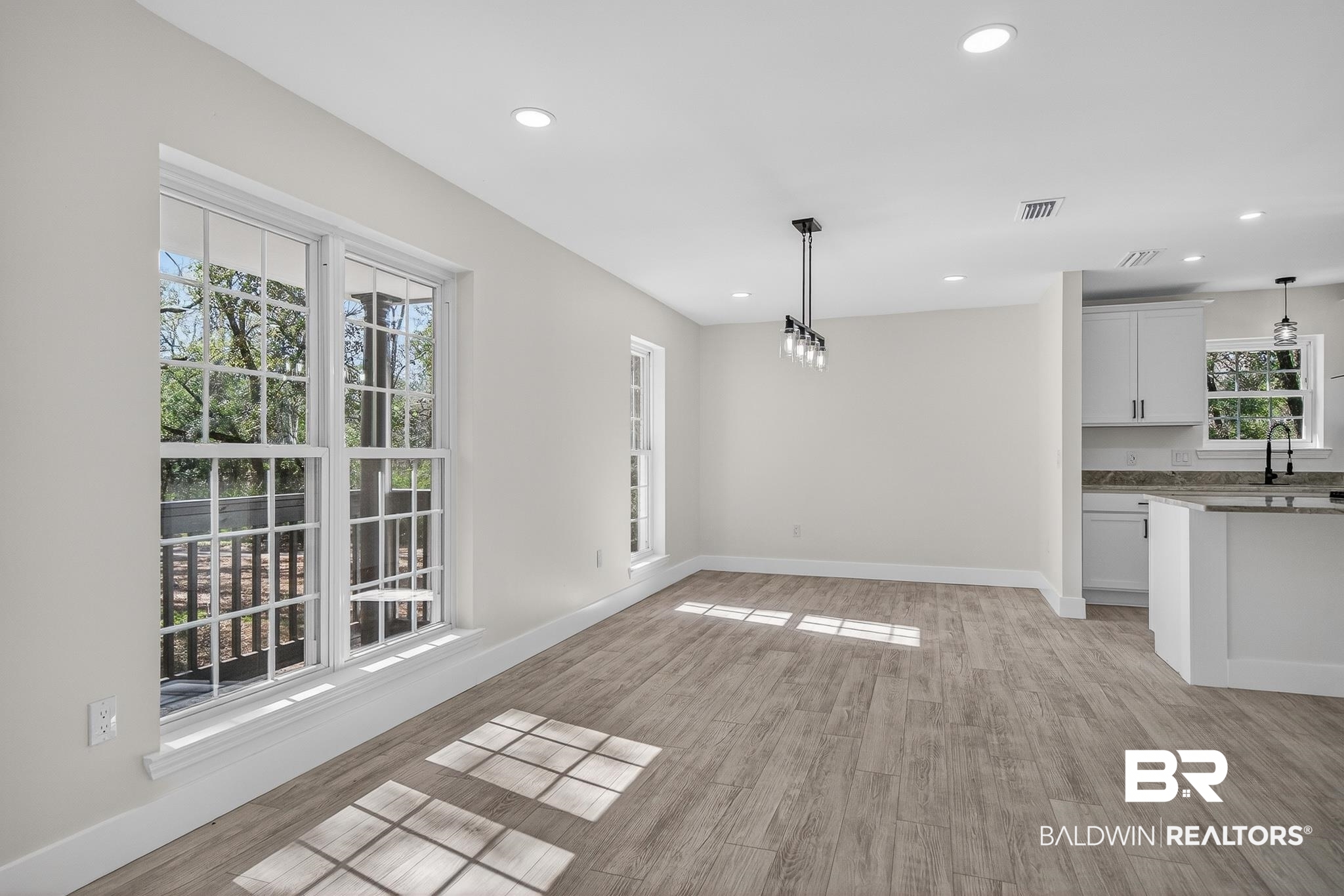 10650 Old Pascagoula Road Theodore, AL 36582 - Photo 14 of 77 Unfurnished dining area with light wood-style floors and recessed lighting