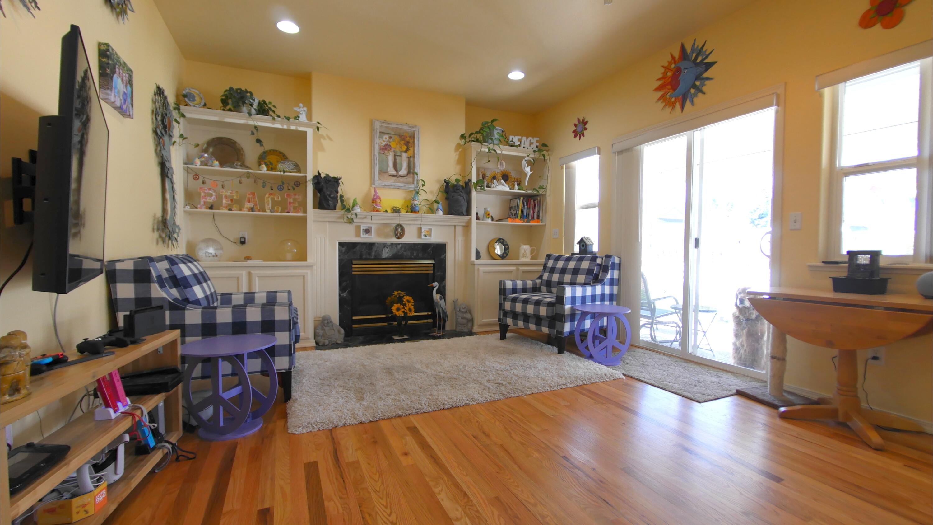 3800 Hilsinger Road Phoenix, OR 97535 - Photo 12 of 30 a living room with furniture and a fireplace