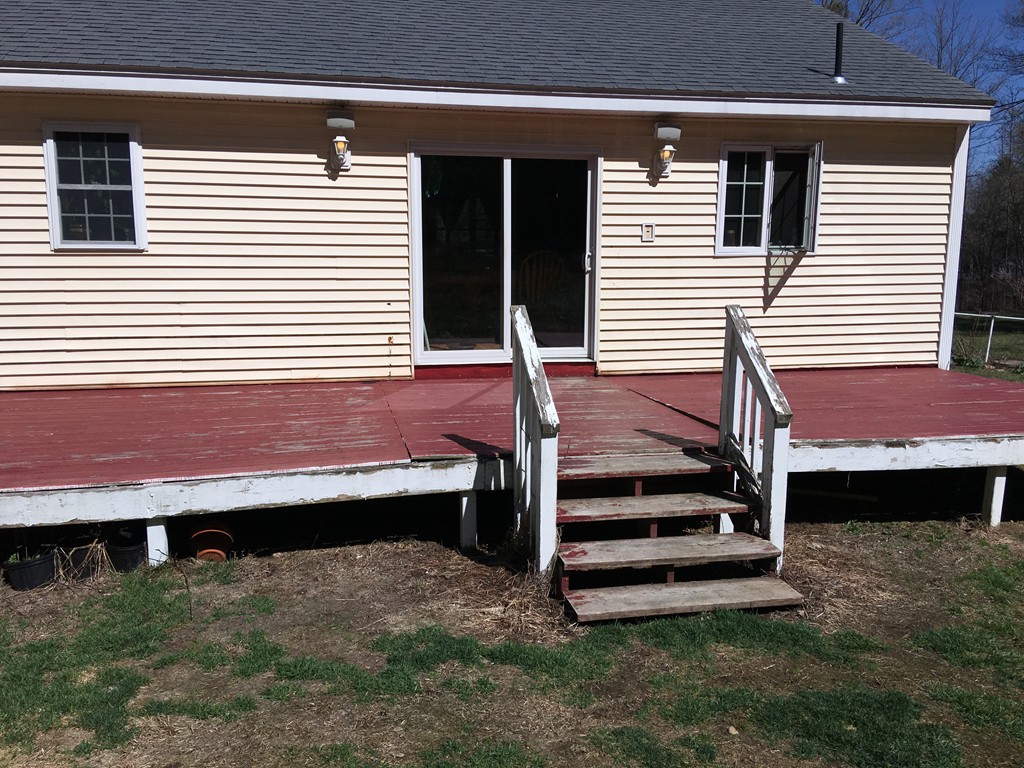 162 East Brimfield Road Holland, MA 01521 - Photo 3 of 21 a view of a backyard with a small cabin