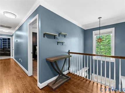 a bathroom with a tub shower and a sink