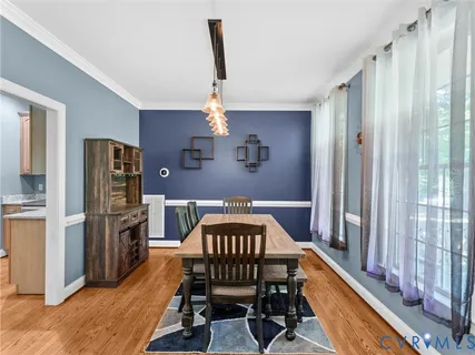 a living room with furniture and a fireplace or television
