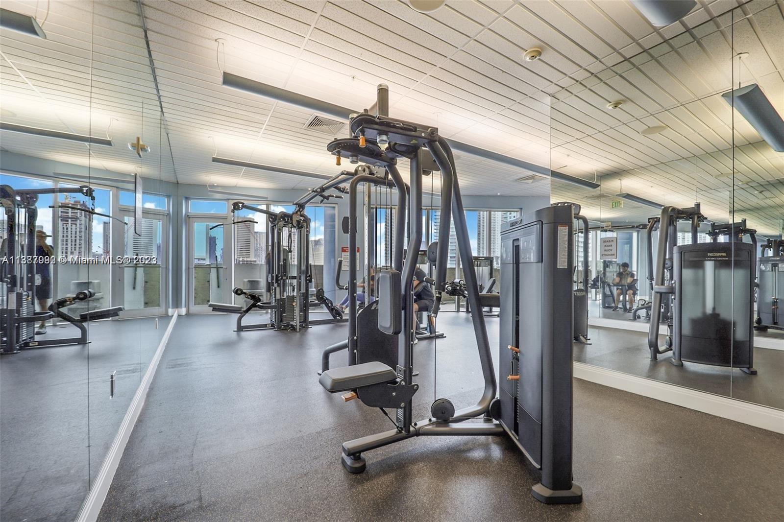 185 Southwest 7th Street, Unit 2204 Miami, FL 33130 - Photo 17 of 29 a view of a room with gym equipment
