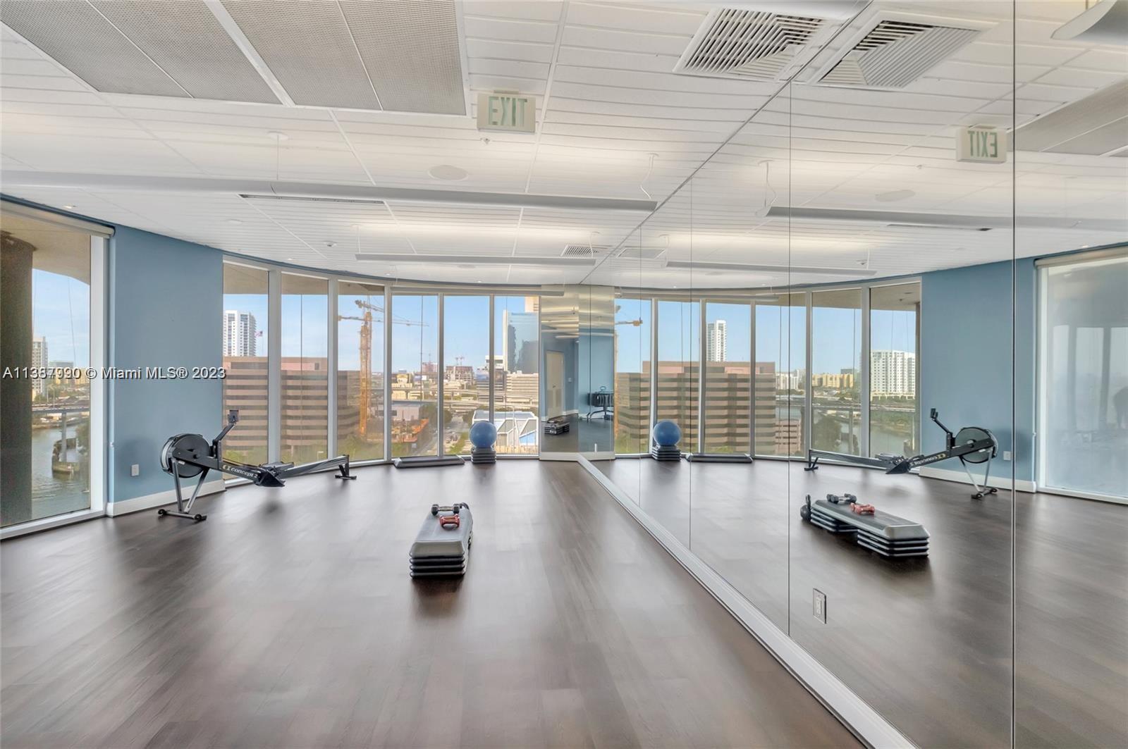 185 Southwest 7th Street, Unit 2204 Miami, FL 33130 - Photo 20 of 29 a view of an empty room with wooden floor