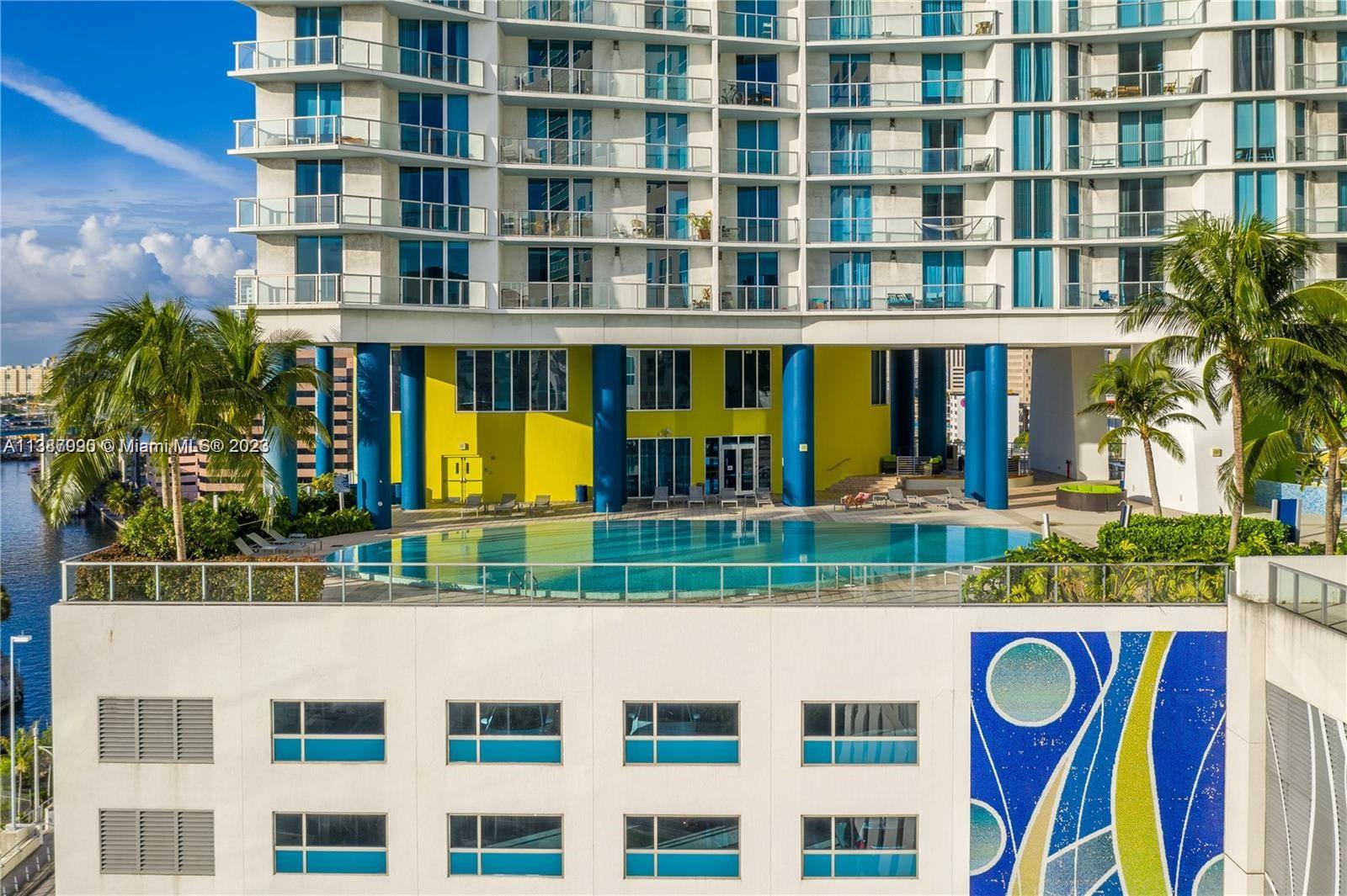 185 Southwest 7th Street, Unit 2204 Miami, FL 33130 - Photo 24 of 29 a front view of a multi story building