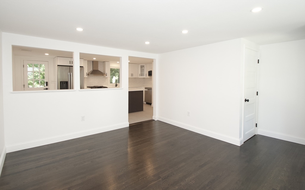 7 Barbara Road Kingston, MA 02364 - Photo 7 of 26 an empty room with wooden floor and windows