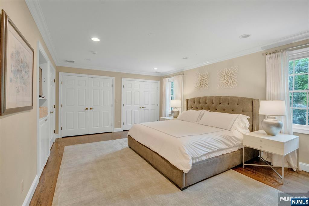 48 Hopper Farm Road Upper Saddle River, NJ 07458 - Photo 26 of 43 a bedroom with a bed and window