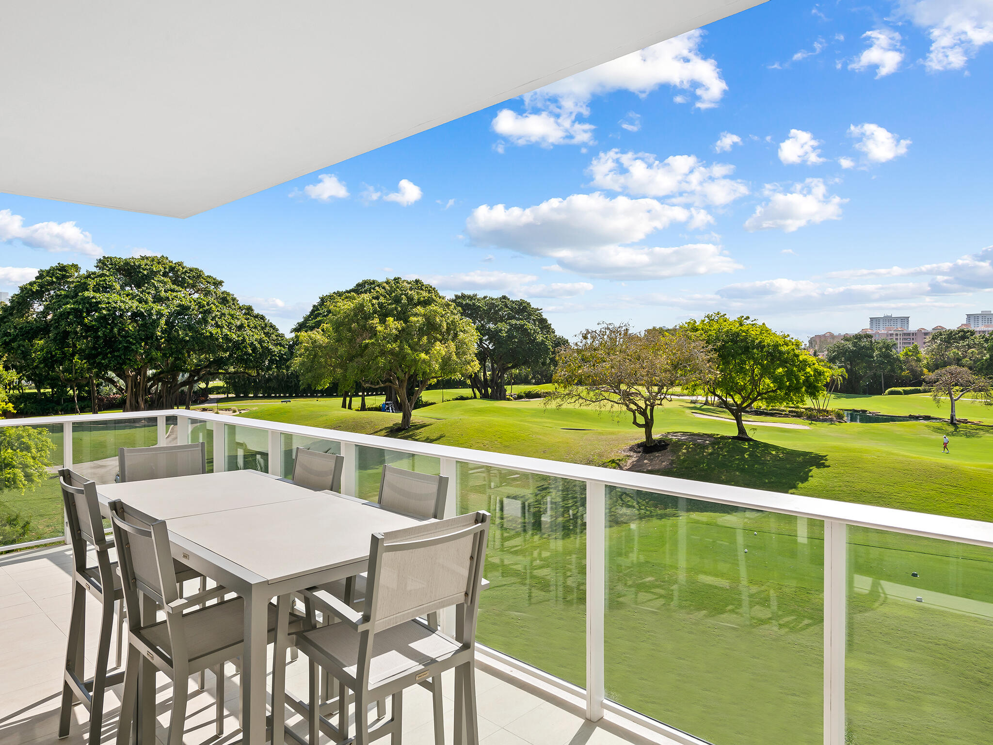 210 Southeast Mizner Boulevard, Unit 301 Boca Raton, FL 33432 - Photo 12 of 66 a view of an chairs and table in patio