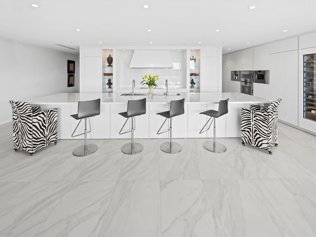 a view of an empty room with a large window