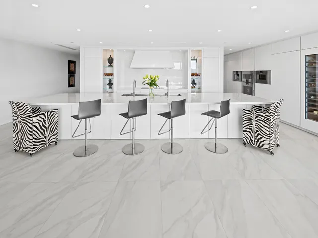 a view of an empty room with a large window