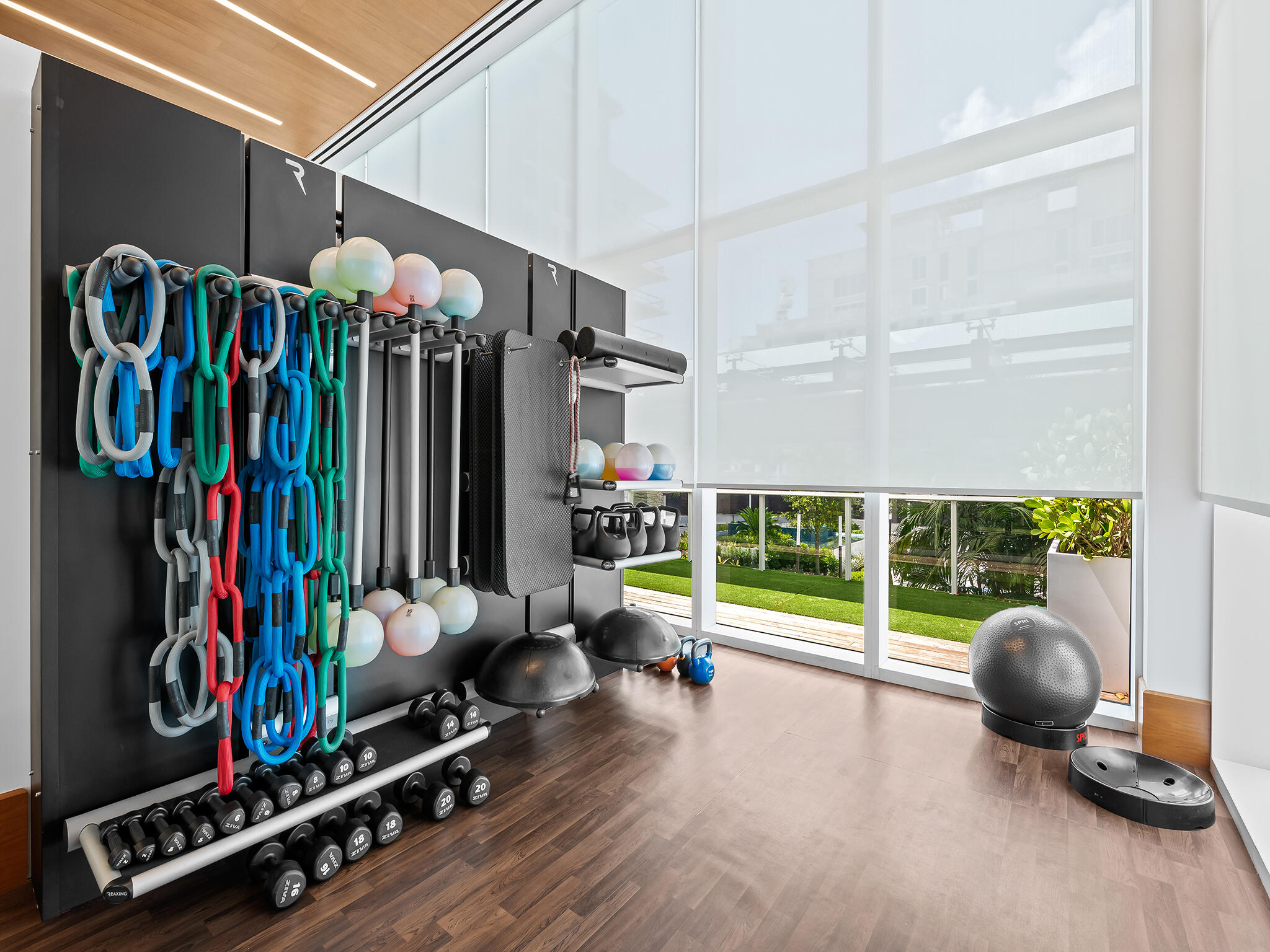 210 Southeast Mizner Boulevard, Unit 301 Boca Raton, FL 33432 - Photo 48 of 66 a view of a room with gym equipment