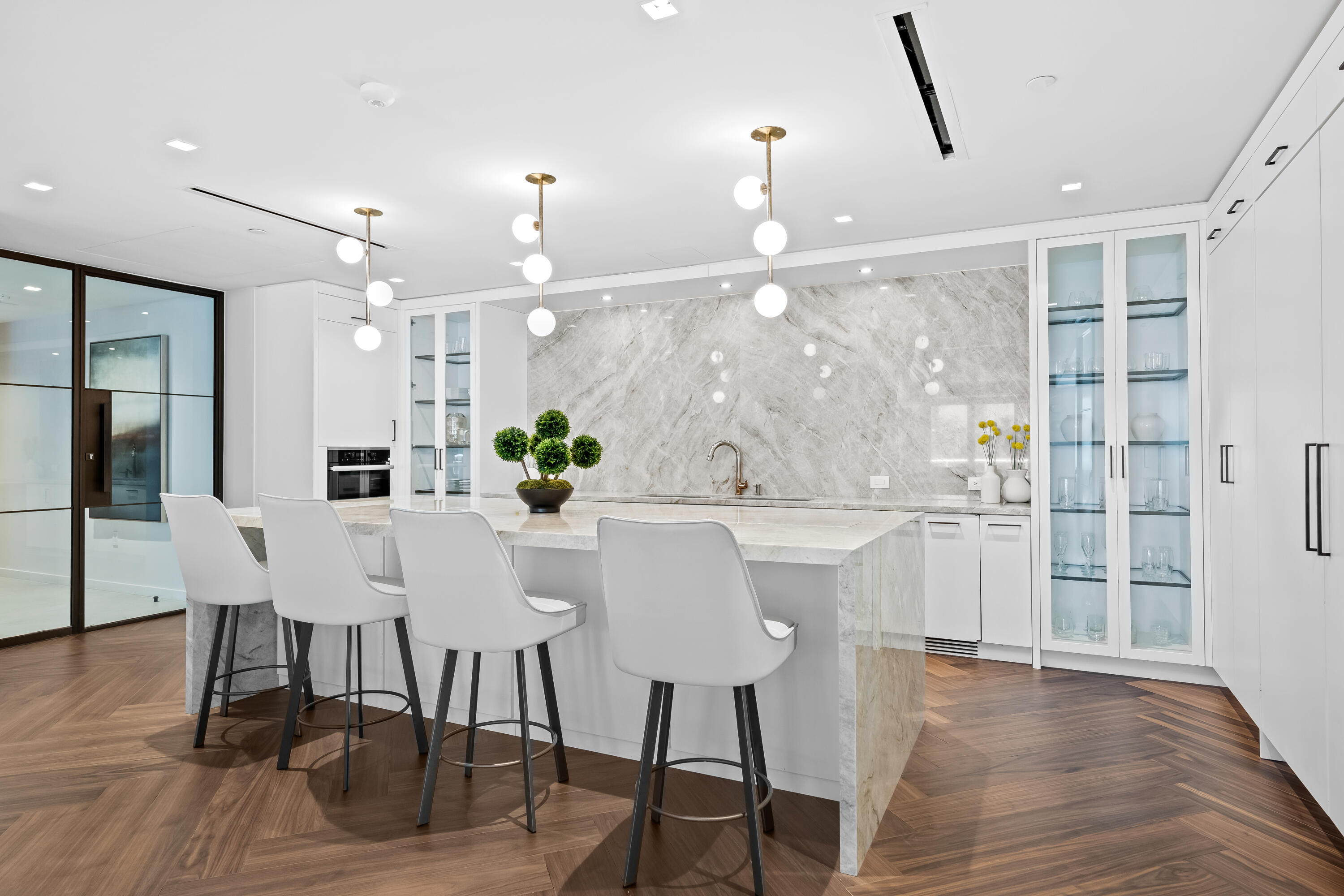 210 Southeast Mizner Boulevard, Unit 301 Boca Raton, FL 33432 - Photo 53 of 66 a view of a kitchen and dining room