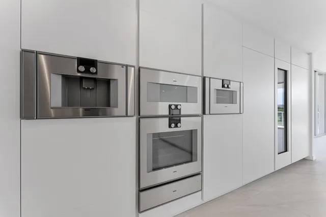 a view of an chairs and table in patio