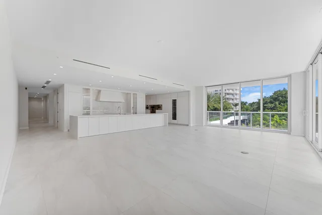 a view of livingroom with furniture and floor to ceiling window