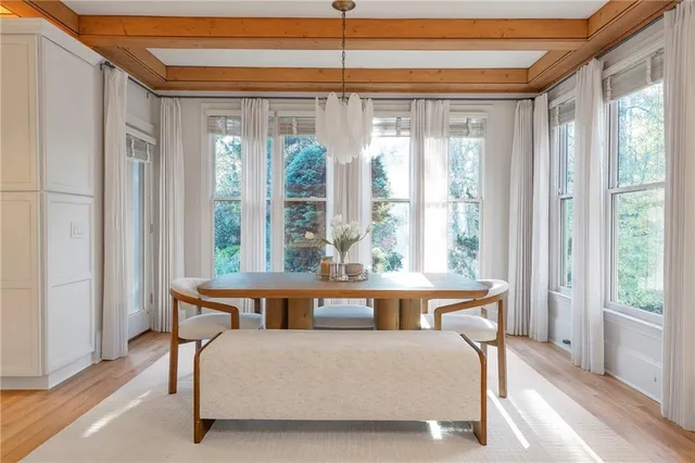 a bathroom with a sink a mirror and a toilet