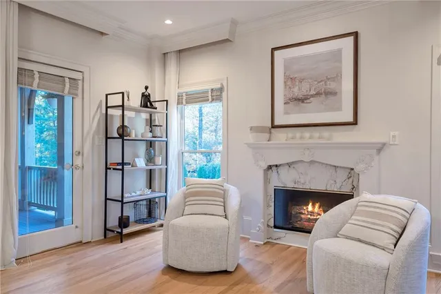 a view of a brick house with many windows