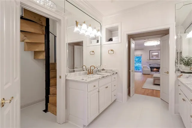 a aerial view of a house with swimming pool next to a yard