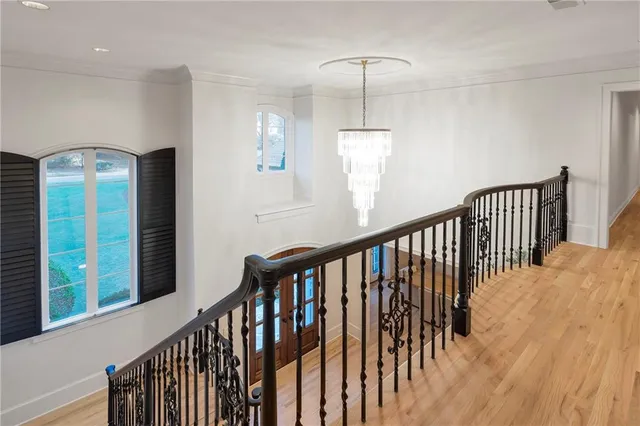 a view of a house with swimming pool and sitting area