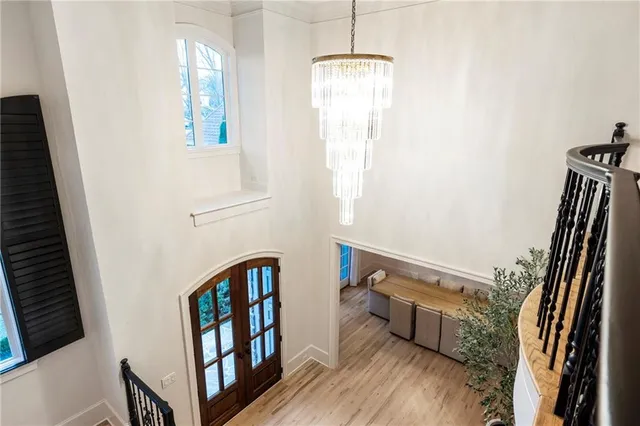 a large kitchen with a table and chairs