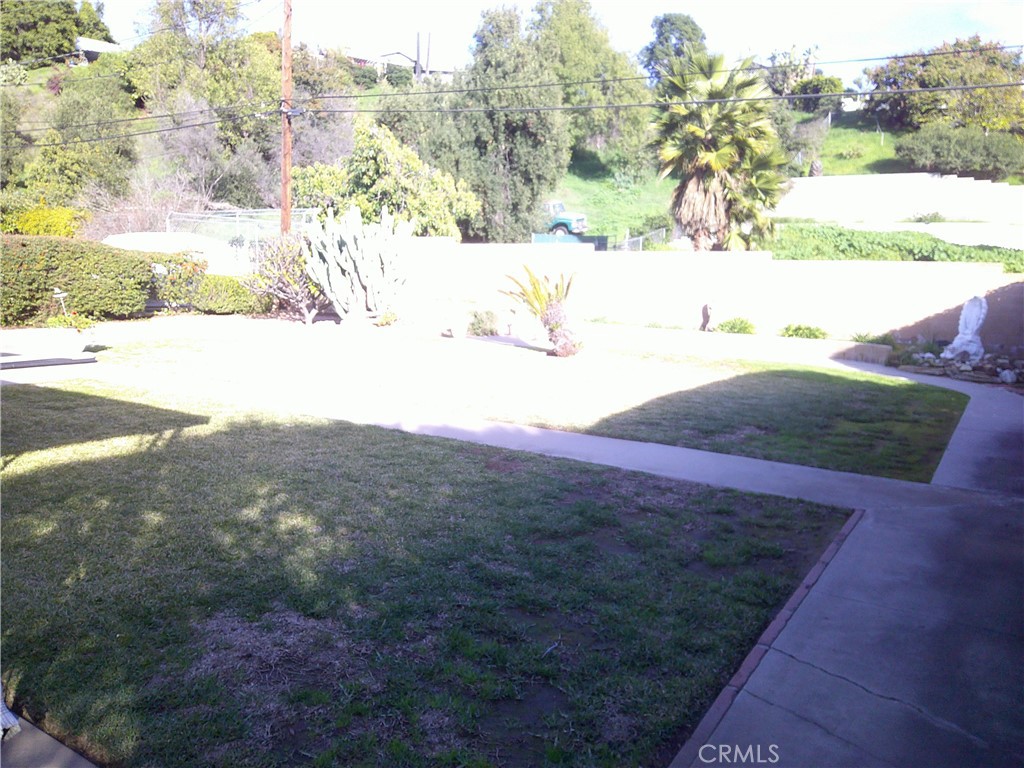 1116 North Old Mill Road Azusa, CA 91702 - Photo 4 of 18 a view of a yard with an ocean